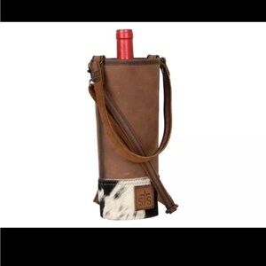 STS ranchwear leather and cowhide wine bottle carrier